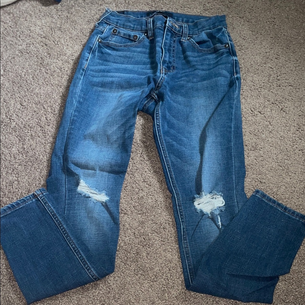 Distressed Blue Jeans